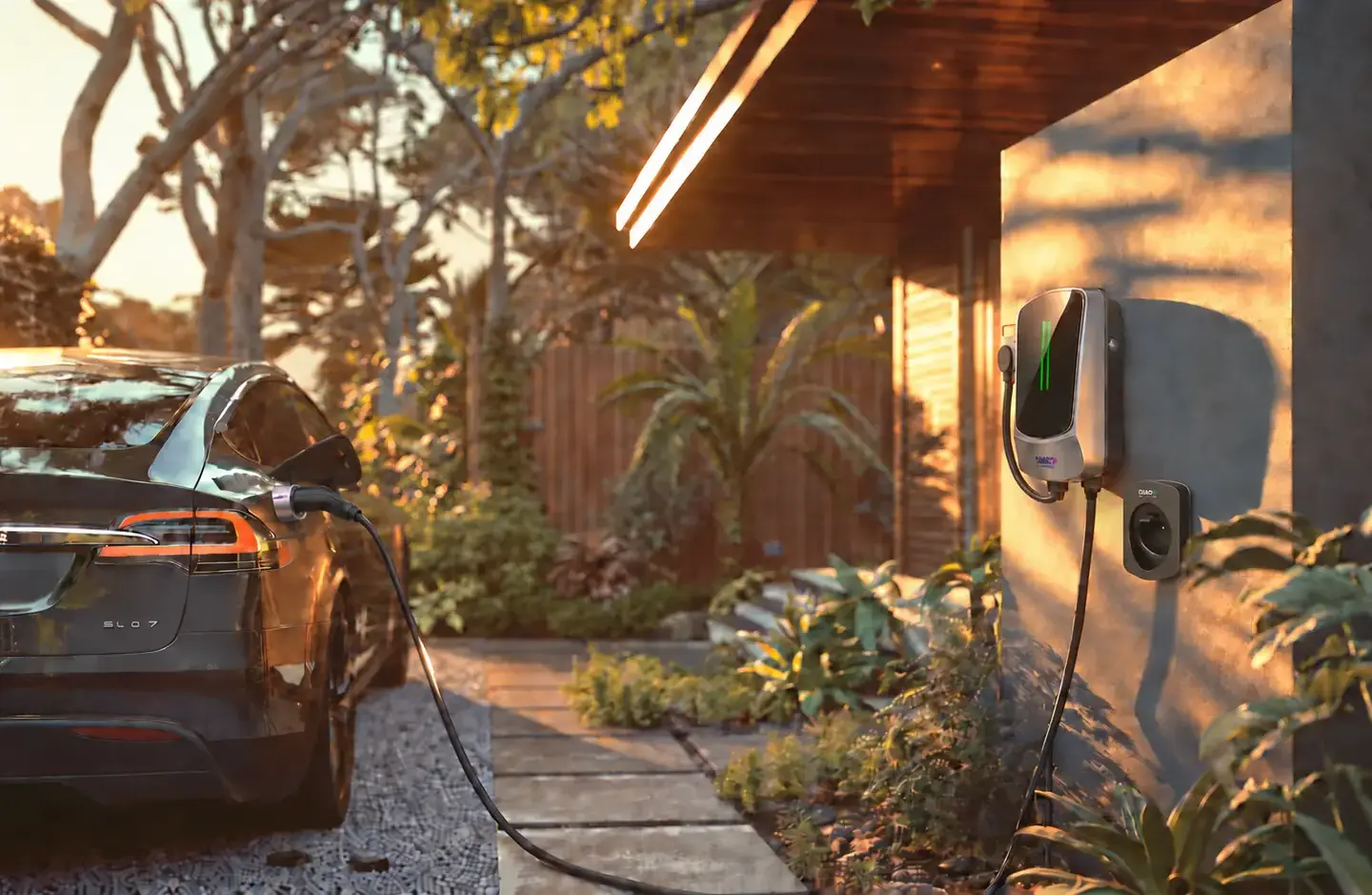 Electric car connected to a wall-mounted QIAO Q6 home EV charger at sunset.
